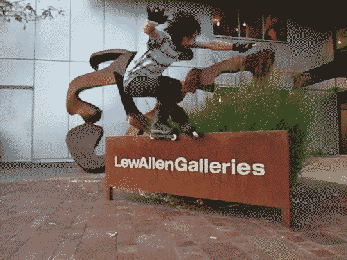 Doing an acid grind on the LewAllen Galleries sign at the Santa Fe Railyard