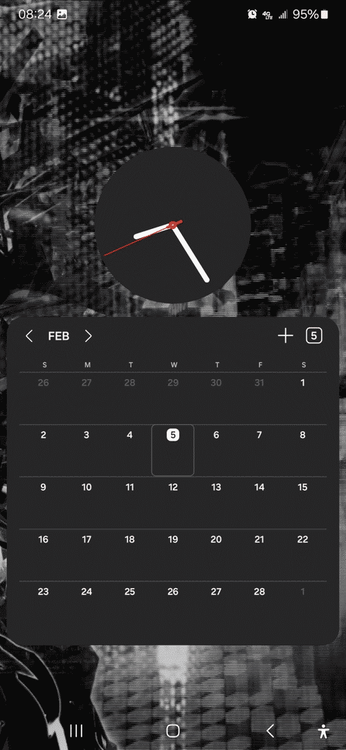 Secondary homescreen on mmx02 with clock and calendar widgets against the same wallpaper