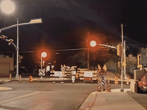 Red traffic light in the middle of the night